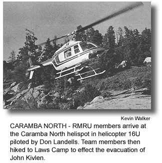 CARAMBA NORTH - RMRU members arrive at the Caramba North helispot in helicopter 16U piloted by Don Landells. Team members then hiked to Laws Camp to effect the evacuation of John Kivlen. (photo by Kevin Walker)