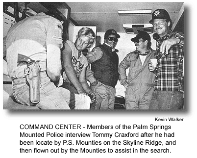 COMMAND CENTER - Members of the PaIm Springs Mounted Police interview Tommy Craxford after he had been locate by P.S. Mounties on the Skyline Ridge, and then flown out by the Mounties to assist in the search. (photo by Kevin Walker)