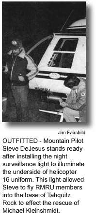 OUTFITTED - Mountain Pilot Steve DeJesus stands ready after installing the night surveillance light to illuminate the underside of helicopter 16 uniform. This light allowed Steve to fly RMRU members into the base of Tahquitz Rock to effect the rescue of Michael Kleinshmidt. (photo by Jim Fairchild)