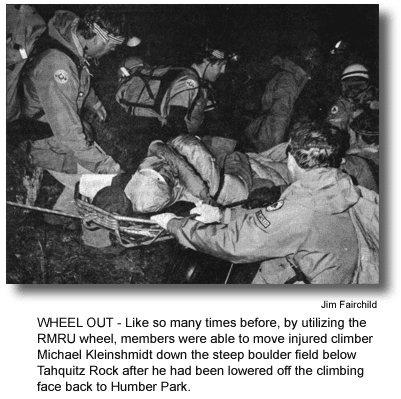 WHEEL OUT - Like so many times before, by utilizing the RMRU wheel, members were able to move injured climber Michael Kleinshmidt down the steep boulder field below Tahquitz Rock after he had been lowered off the climbing face back to Humber Park. (photo by Jim Fairchild)