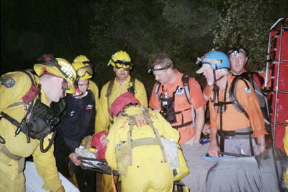 CDF Firefighters and RMRU members giving aid at trailhead (Photo by Kirk Cloyd)