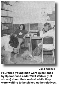 Four tired young men were questioned by 0perations Leader Walt Walker (not shown) about their ordeal, while they were waiting to be picked up by relatives. (photo by Jim Fairchild)
