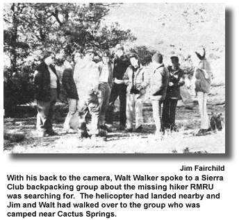 With his back to the camera, Walt Walker spoke to a Sierra Club backpacking group about the missing hiker RMRU was searching for. The helicopter had landed nearby and Jim and Walt had walked over to the group who was camped near Cactus Springs. (photo by Jim Fairchild)