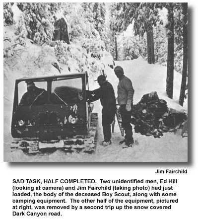 SAD TASK, HALF COMPLETED. Two unidentified men, Ed Hill (looking at camera) and Jim Fairchild (taking photo) had just loaded, the body of the deceased Boy Scout, along with some camping equipment. The other half of the equipment, pictured at right, was removed by a second trip up the snow covered Dark Canyon road. (photo by Jim Fairchild)