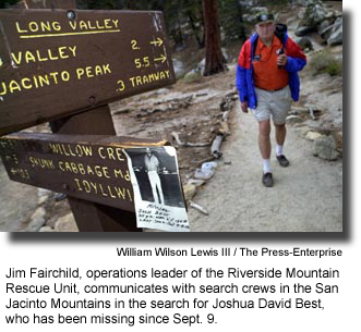 Jim Fairchild, operations leader of the Riverside Mountain Rescue Unit, communicates with search crews in the San Jacinto Mountains in the search for Joshua David Best, who has been missing since Sept. 9. (photo by William Wilson Lewis III / The Press-Enterprise)