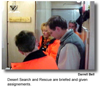 Desert Search and Rescue are briefed and given assignements. (photo by Darrell Bell)